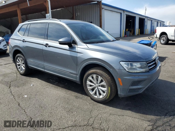 2020 Volkswagen Tiguan S with VIN 3VV1B7AXXLM123021, listed as a Copart auction lot 58362715 with 88,548 mi miles and Salvage title. Bid and sale history available at DreamBid. Image 4.