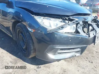 2017 Honda Civic Sedan LX with VIN 2HGFC2F57HH568416, listed as a IAAI auction lot 41812251 with 160,936 mi miles. Bid and sale history available at carsss.com. Image 17.