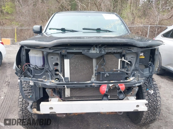 2011 Toyota Tacoma with VIN 3TMLU4EN1BM067901, listed as a IAAI auction lot 42043408 with 186,499 mi miles and . Bid and sale history available at carsss.com. Image 12.