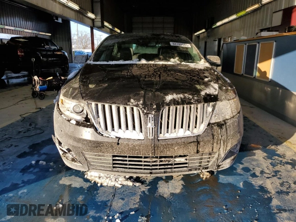 2012 Lincoln MKS с VIN 1LNHL9ER6CG802551, выставлен на аукционе Copart как лот 88782585 с пробегом Не указан миль и Списание • Salvage title. История ставок и продаж доступна на DreamBid. Изображение 5.