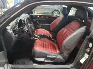2012 Volkswagen Beetle Turbo with VIN 3VWVA7AT4CM665261, listed as a Copart auction lot 50562025 with 62,570 mi miles and Salvage Title. Bid and sale history available at DreamBid. Image 7.