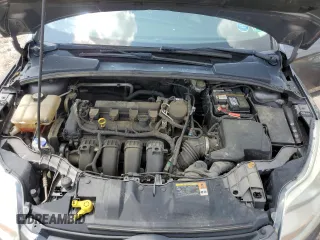 2013 Ford Focus SE z VIN 1FADP3F26DL344904, wystawiony jako Copart lot #59965505 z przebiegiem 162 202 mil mil oraz Czysty tytuł • Clean title. Historia ofert i sprzedaży dostępna na DreamBid. Obrazek 11.