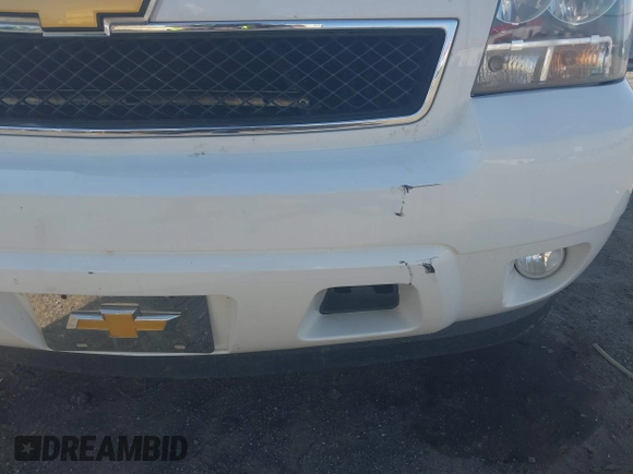 2014 Chevrolet Tahoe LT with VIN 1GNSCBE06ER233105, listed as a IAAI auction lot 41753190 with 161,056 mi miles and . Bid and sale history available at DreamBid. Image 17.