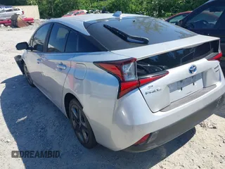 2020 Toyota Prius L Eco z VIN JTDKARFUXL3125434, wystawiony jako IAAI lot #42201623 z przebiegiem 58 609 mil mil oraz . Historia ofert i sprzedaży dostępna na DreamBid. Obrazek 3.