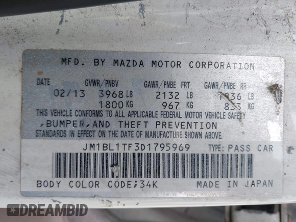2013 Mazda 3 i SV with VIN JM1BL1TF3D1795969, listed as a IAAI auction lot 42075242 with 169,331 mi miles. Bid and sale history available at carsss.com. Image 9.