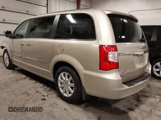 2014 Chrysler Town & Country Touring with VIN 2C4RC1BG3ER295722, listed as a IAAI auction lot 41705820 with 142,587 mi miles and . Bid and sale history available at DreamBid. Image 3.
