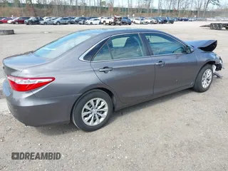 2015 Toyota Camry XLE with VIN 4T4BF1FKXFR465183, listed as a IAAI auction lot 41994681 with 113,891 mi miles and . Bid and sale history available at carsss.com. Image 4.