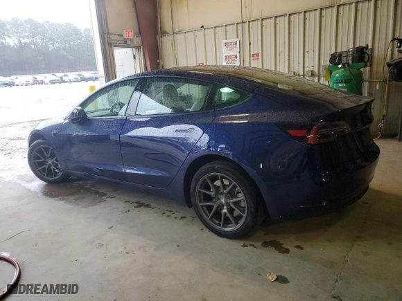 2023 Tesla Model 3 with VIN 5YJ3E1EA4PF588163, listed as a Copart auction lot 88884335 with 14,537 mi miles and Salvage Title. Bid and sale history available at carsss.com. Image 2.