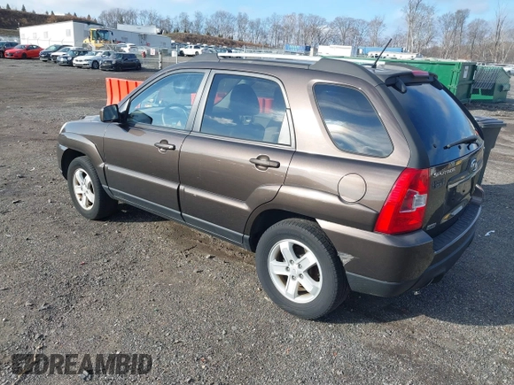 2009 Kia Sportage LX with VIN KNDJE723097623239, listed as a IAAI auction lot 41233933 with 169,444 mi miles. Bid and sale history available at carsss.com. Image 3.