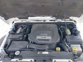 2014 Jeep Wrangler Unlimited Sahara with VIN 1C4BJWEG6EL203866, listed as a IAAI auction lot 41846091 with 105,296 mi miles. Bid and sale history available at carsss.com. Image 10.