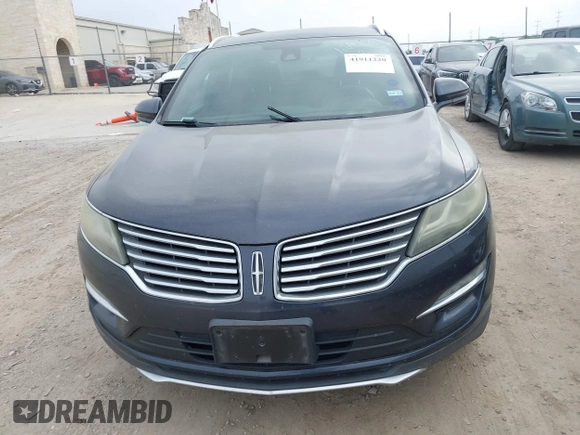 2015 Lincoln MKC with VIN 5LMCJ1A94FUJ13716, listed as a IAAI auction lot 41911220 with 194,825 mi miles. Bid and sale history available at carsss.com. Image 12.