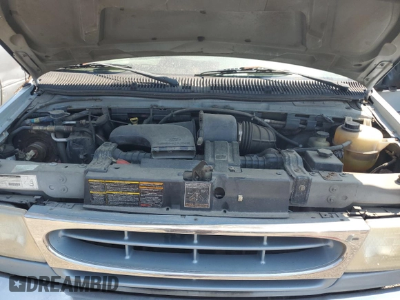 2000 Ford Econoline Cargo Recreational with VIN 1FDRE14L5YHA56690, listed as a Copart auction lot 58926155 with 162,797 mi miles and Salvage title. Bid and sale history available at DreamBid. Image 12.