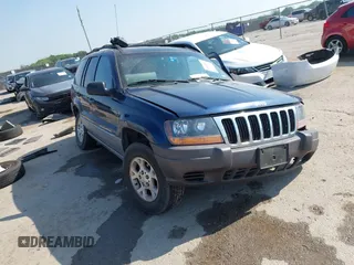 2000 Jeep Grand Cherokee Laredo with VIN 1J4G248S5YC413977, listed as a IAAI auction lot 42045808 with Not provided miles and . Bid and sale history available at DreamBid. Image 1.