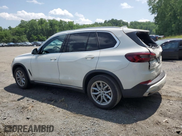 2023 BMW X5 xDrive40i with VIN 5UXCR6C03P9P75351, listed as a Copart auction lot 61465655 with 24,883 mi miles and Salvage title. Bid and sale history available at DreamBid. Image 2.