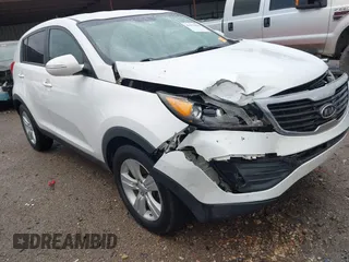 2012 Kia Sportage LX with VIN KNDPB3A2XC7283612, listed as a IAAI auction lot 41957810 with 165,899 mi miles. Bid and sale history available at carsss.com. Image 1.