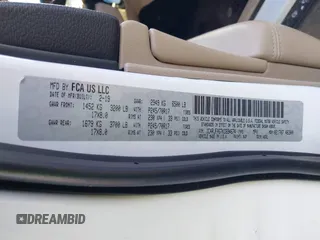 2019 Jeep Grand Cherokee Laredo E with VIN 1C4RJFAG7KC694674, listed as a IAAI auction lot 41591678 with 61,144 mi miles. Bid and sale history available at carsss.com. Image 9.