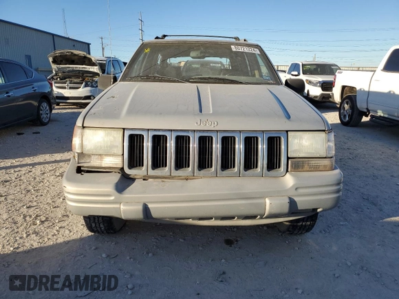 1998 Jeep Grand Cherokee with VIN 1J4FX48S4WC345469, listed as a Copart auction lot 80721224 with 201,543 mi miles and Salvage title. Bid and sale history available at DreamBid. Image 5.