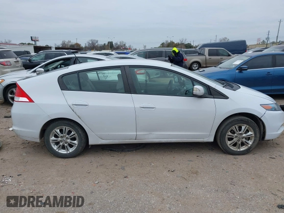 2010 Honda Insight EX with VIN JHMZE2H71AS035091, listed as a IAAI auction lot 41380128 with 181,653 mi miles and . Bid and sale history available at DreamBid. Image 14.