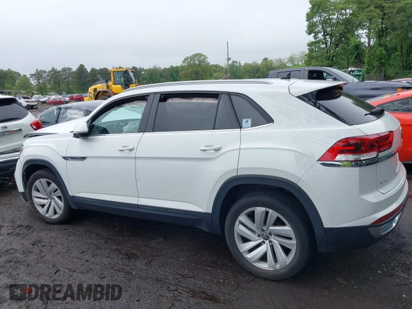 2021 Volkswagen Atlas SE z VIN 1V2KE2CAXMC202664, wystawiony jako IAAI lot #42292276 z przebiegiem 57 760 mil mil oraz . Historia ofert i sprzedaży dostępna na DreamBid. Obrazek 14.