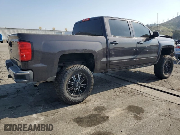 2015 Chevrolet Silverado 1500 LT with VIN 3GCPCREC4FG509459, listed as a Copart auction lot 54014785 with 73,132 mi miles and Salvage Title. Bid and sale history available at DreamBid. Image 3.