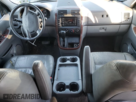 2003 Kia Sedona LX with VIN KNDUP131036461742, listed as a Copart auction lot 83338164 with 111,120 mi miles and Salvage Title. Bid and sale history available at carsss.com. Image 8.