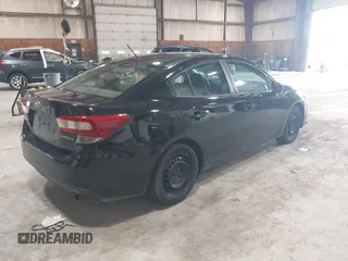 2021 Subaru Impreza with VIN 4S3GKAB64M3601075, listed as a IAAI auction lot 42530164 with 90,522 mi miles and . Bid and sale history available at DreamBid. Image 4.