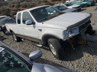 2003 Ford F-150 XL with VIN 1FTRX18L03NA96484, listed as a Copart auction lot 50834755 with 242,836 mi miles and Salvage title. Bid and sale history available at DreamBid. Image 4.