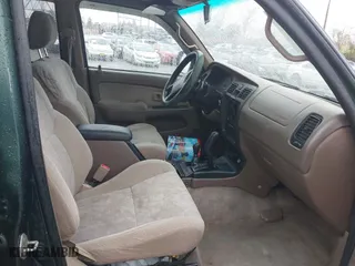 2000 Toyota 4Runner SR5 with VIN JT3HN86R9Y0294975, listed as a IAAI auction lot 41985007 with 218,761 mi miles. Bid and sale history available at carsss.com. Image 5.