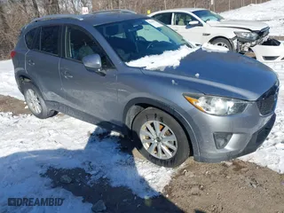 2013 Mazda CX-5 Touring with VIN JM3KE2CE7D0129623, listed as a IAAI auction lot 41344623 with 147,025 mi miles. Bid and sale history available at carsss.com. Image 1.
