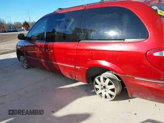 2005 Chrysler Town & Country Touring with VIN 2C8GP54L65R233842, listed as a IAAI auction lot 41682211 with 232,830 mi miles. Bid and sale history available at carsss.com. Image 12.