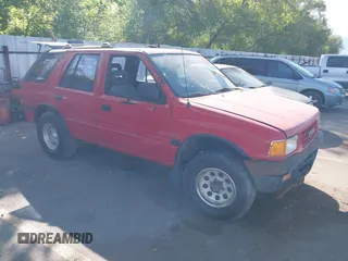 1994 Isuzu Rodeo LS z VIN 4S2CY58V6R4322459, wystawiony jako IAAI lot #42476512 z przebiegiem 179 635 mil mil oraz . Historia ofert i sprzedaży dostępna na DreamBid. Obrazek 1.