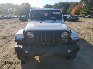 2021 Jeep Gladiator Willys with VIN 1C6HJTAG7ML557920, listed as a Copart auction lot 75614284 with 17,223 mi miles and Salvage title. Bid and sale history available at DreamBid. Image 5.