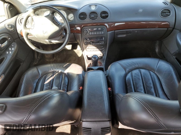 2000 Chrysler LHS with VIN 2C3HC56G6YH333438, listed as a Copart auction lot 50372495 with 97,826 mi miles and Salvage Title. Bid and sale history available at DreamBid. Image 8.
