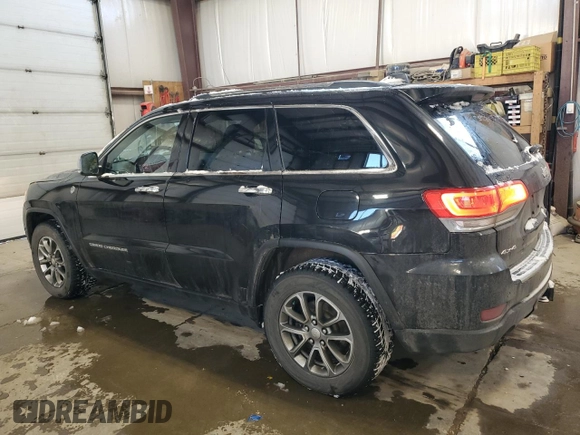 2014 Jeep Grand Cherokee Limited with VIN 1C4RJFBG5EC322141, listed as a Copart auction lot 84431254 with 162,698 mi miles and Salvage Title. Bid and sale history available at DreamBid. Image 2.
