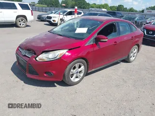 2013 Ford Focus SE with VIN 1FADP3F21DL318968, listed as a IAAI auction lot 42586198 with 118,998 mi miles and . Bid and sale history available at DreamBid. Image 2.