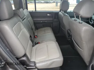 2016 Ford Flex SEL z VIN 2FMGK5C81GBA00813, wystawiony jako Copart lot #55387225 z przebiegiem 187 494 mil mil oraz Szkoda całkowita • Salvage title. Historia ofert i sprzedaży dostępna na DreamBid. Obrazek 11.