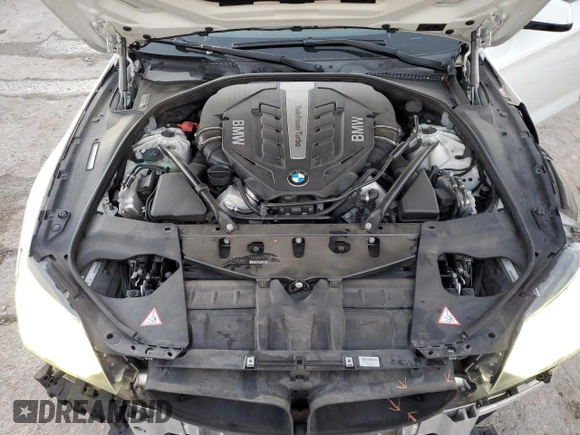 2014 BMW 6 Series 650i z VIN WBA6B2C54ED128858, wystawiony jako Copart lot #79132084 z przebiegiem 29 244 mil mil oraz Szkoda całkowita • Salvage title. Historia ofert i sprzedaży dostępna na DreamBid. Obrazek 11.