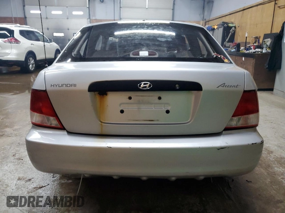2002 Hyundai Accent with VIN KMHCF35G82U192732, listed as a Copart auction lot 85187074 with 224,194 mi miles and Clean title. Bid and sale history available at DreamBid. Image 6.