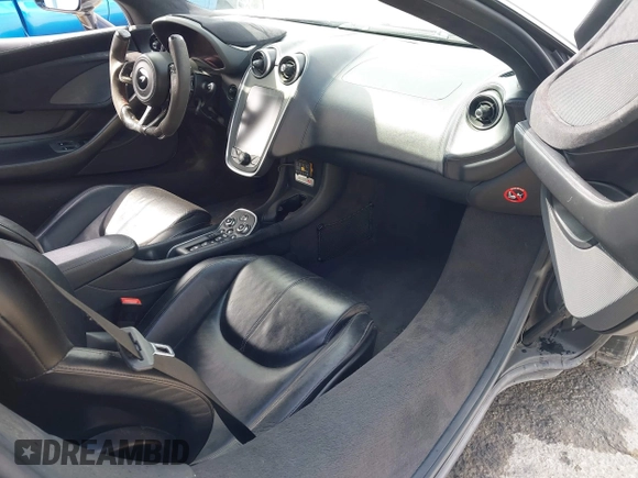 2019 McLaren 570S z VIN SBM13DAA2KW006285, wystawiony jako IAAI lot #41774081 z przebiegiem 24 032 mil mil oraz . Historia ofert i sprzedaży dostępna na DreamBid. Obrazek 5.