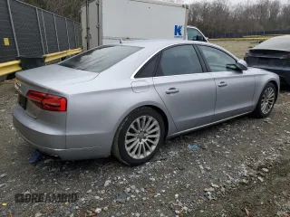 2015 Audi A8 4.0T with VIN WAUJ2AFD0FN006646, listed as a Copart auction lot 86164984 with 143,101 mi miles and Salvage title. Bid and sale history available at DreamBid. Image 3.