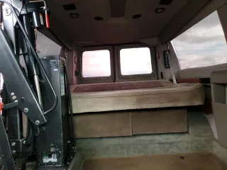 2000 Ford Econoline Cargo Recreational with VIN 1FDRE14LXYHA39870, listed as a Copart auction lot 41824065 with 112,028 mi miles and Salvage title. Bid and sale history available at DreamBid. Image 10.