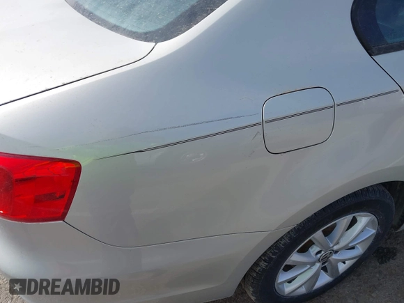 2011 Volkswagen Jetta SE with VIN 3VWDZ7AJXBM098328, listed as a IAAI auction lot 41819874 with 133,877 mi miles and . Bid and sale history available at DreamBid. Image 6.