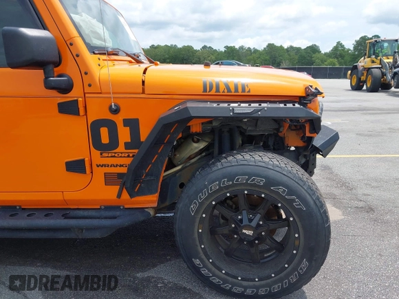 2013 Jeep Wrangler Sport z VIN 1C4AJWAG2DL538526, wystawiony jako IAAI lot #42378501 z przebiegiem 81 709 mil mil oraz . Historia ofert i sprzedaży dostępna na DreamBid. Obrazek 19.