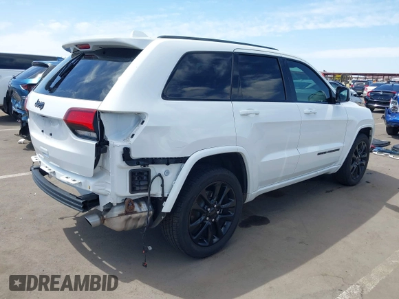 2021 Jeep Grand Cherokee Laredo E with VIN 1C4RJEAG2MC785168, listed as a IAAI auction lot 42115460 with 64,036 mi miles and . Bid and sale history available at DreamBid. Image 4.