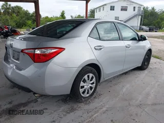 2015 Toyota Corolla L with VIN 2T1BURHE5FC461887, listed as a IAAI auction lot 42560992 with 176,660 mi miles and . Bid and sale history available at DreamBid. Image 4.