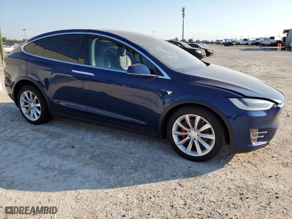 2017 Tesla Model X P100D with VIN 5YJXCBE44HF047316, listed as a Copart auction lot 76130464 with NaN miles and Salvage Title. Bid and sale history available at carsss.com. Image 4.