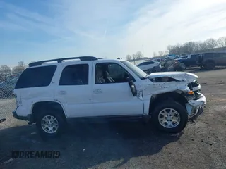 2005 Chevrolet Tahoe Z71 z VIN 1GNEK13T55R268077, wystawiony jako IAAI lot #41442024 z przebiegiem 205 176 mil mil oraz . Historia ofert i sprzedaży dostępna na DreamBid. Obrazek 13.