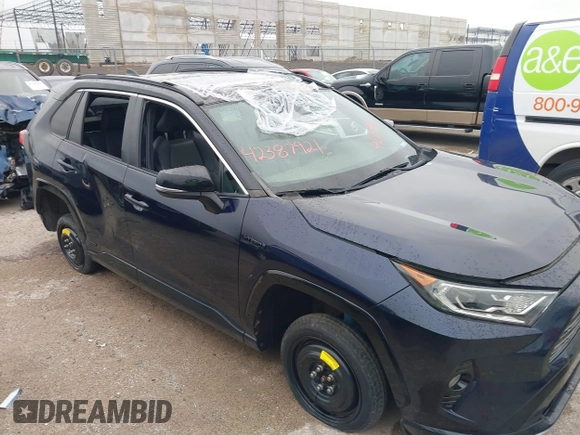 2021 Toyota RAV4 Hybrid XSE with VIN 2T3E6RFV5MW002856, listed as a IAAI auction lot 42387921 with Not provided miles and . Bid and sale history available at DreamBid. Image 6.