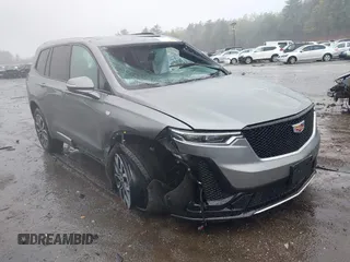 2023 Cadillac XT6 AWD Sport with VIN 1GYKPHRS2PZ179987, listed as a IAAI auction lot 42169973 with 20,623 mi miles and . Bid and sale history available at DreamBid. Image 1.
