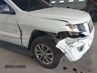 2014 Jeep Grand Cherokee Limited with VIN 1C4RJFBG6EC545840, listed as a IAAI auction lot 40142948 with 167,353 mi miles. Bid and sale history available at carsss.com. Image 6.